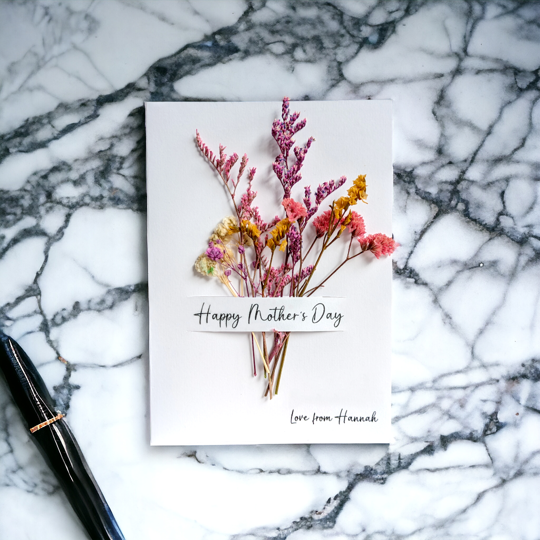 White mother's day card with dried flowers