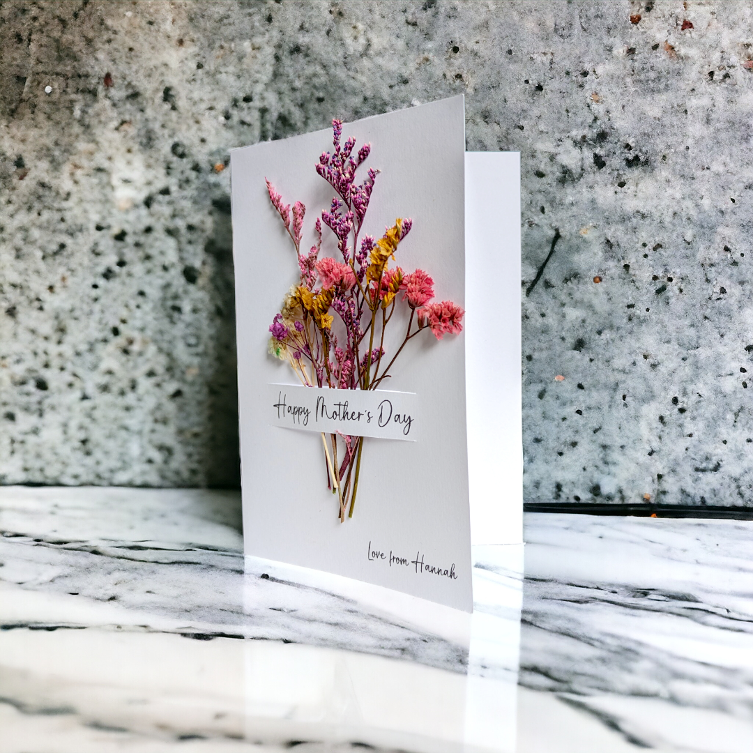 White mother's day card with dried flowers