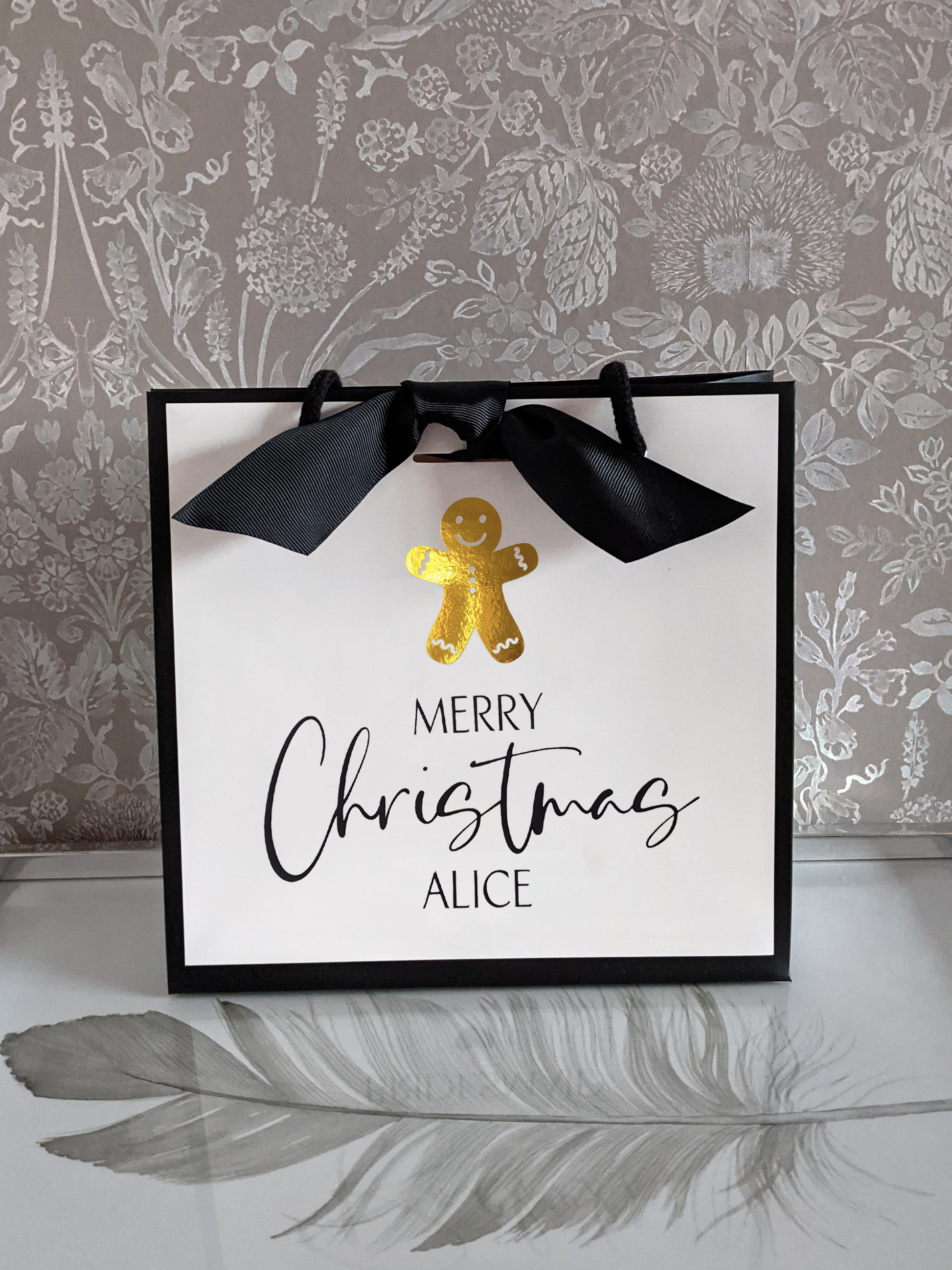 Personalised Christmas gift bag with name, chrome gold gingerbread man, size small