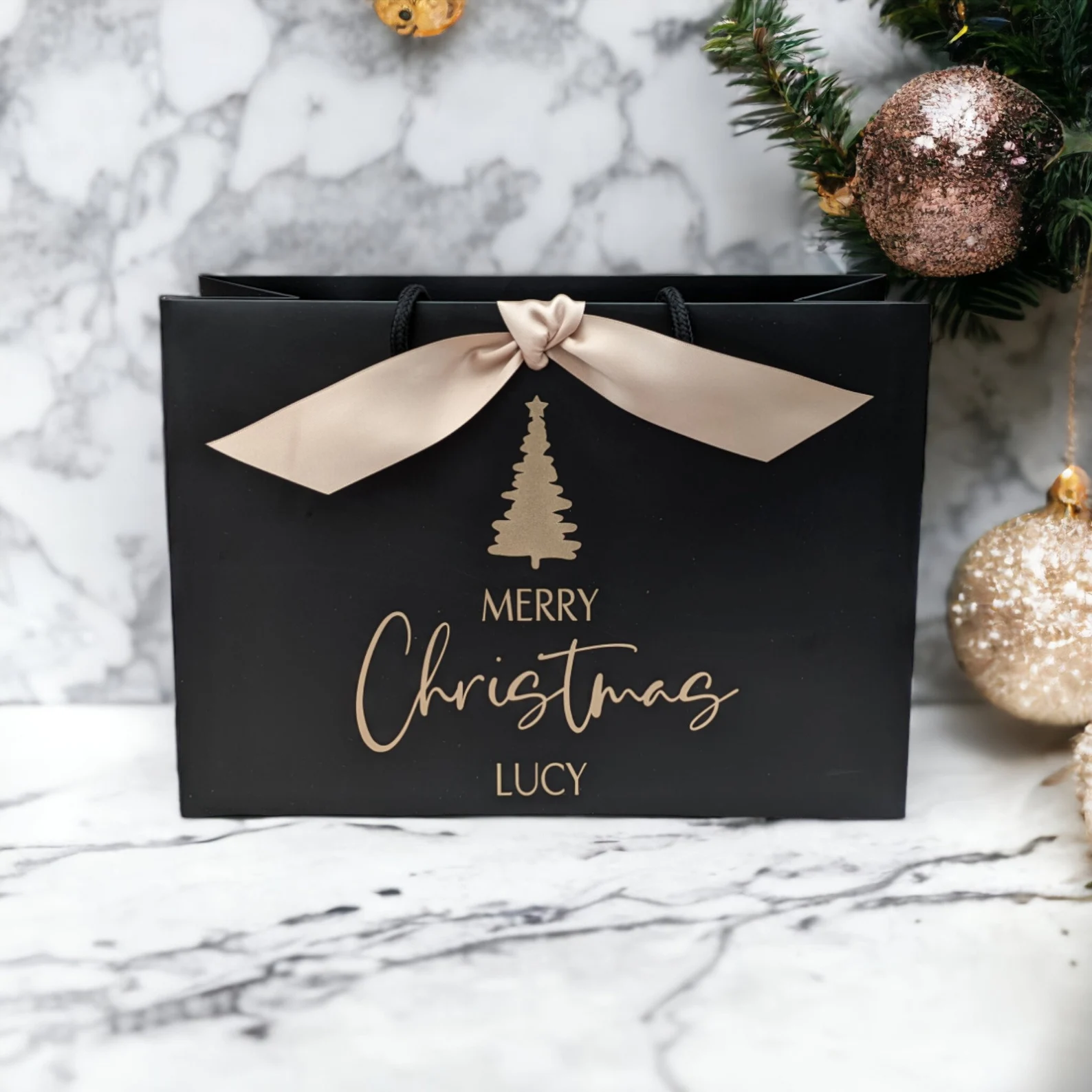 Personalised Christmas gift bag with name, black bag with gold ribbon